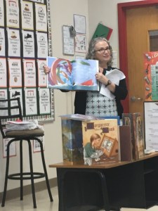Showing picture books I brought along.